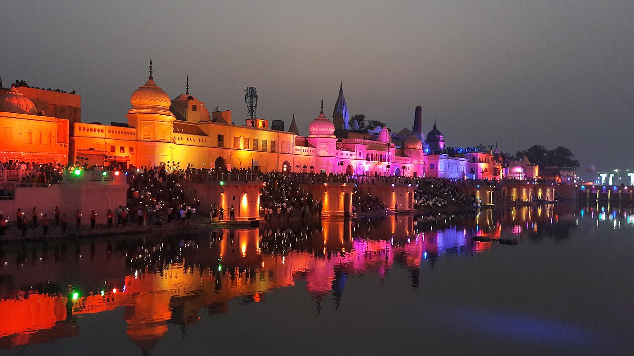 Saryu river ghats glowing with lamps at night, Ayodhya